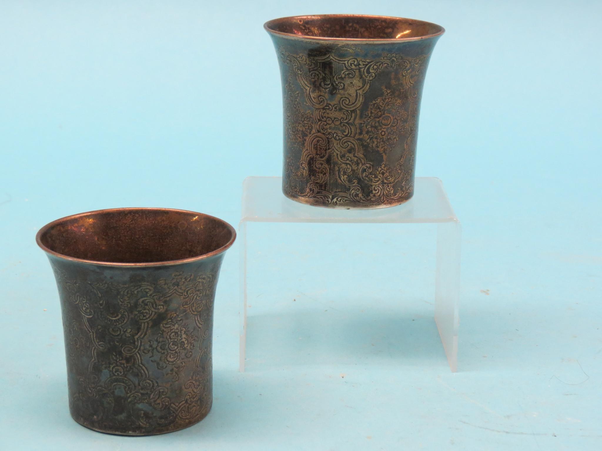 Appraisal: A pair of mid th century French silver beakers engraved