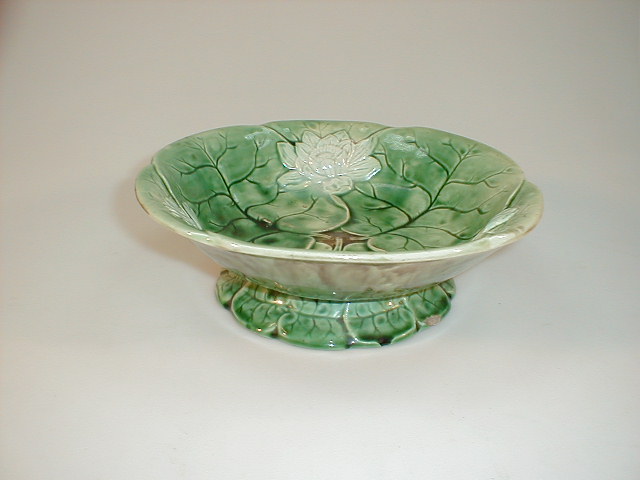 Appraisal: A Victorian majolica green leaf pedestal bowl