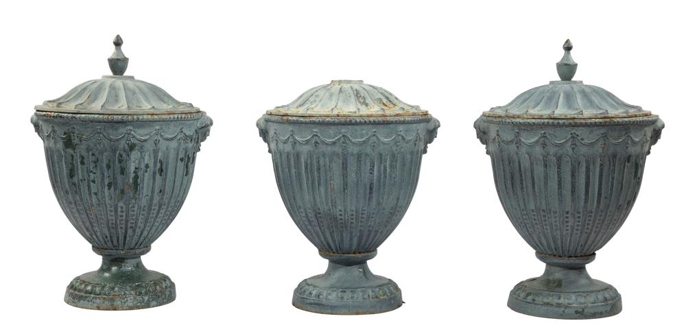 Appraisal: Three Antique Patinated Lead Garden Urns finialed lids fluted body