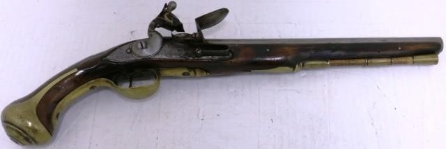 Appraisal: TH C ENGLISH BRASS MOUNTED FLINTLOCK PISTOL BYJORDAN CARVED WOOD