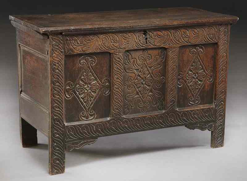 Appraisal: Early English carved oak coffer the front carved with stylized