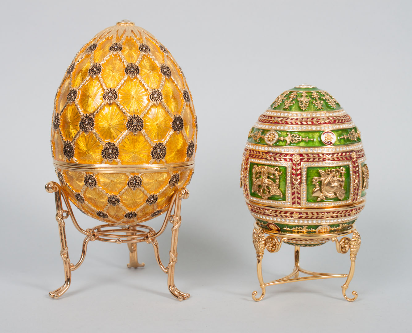 Appraisal: Two Faberge enameled metal eggs th century each elaborately enameled