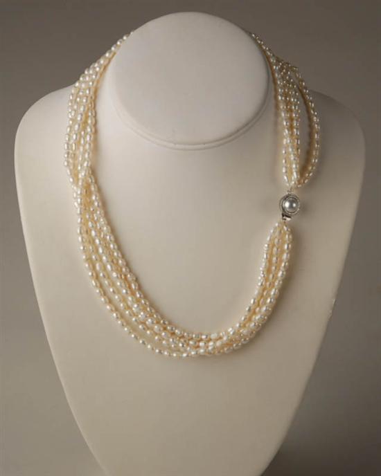 Appraisal: A Five Strand Freshwater Cultured Pearl Necklace with a silvertone