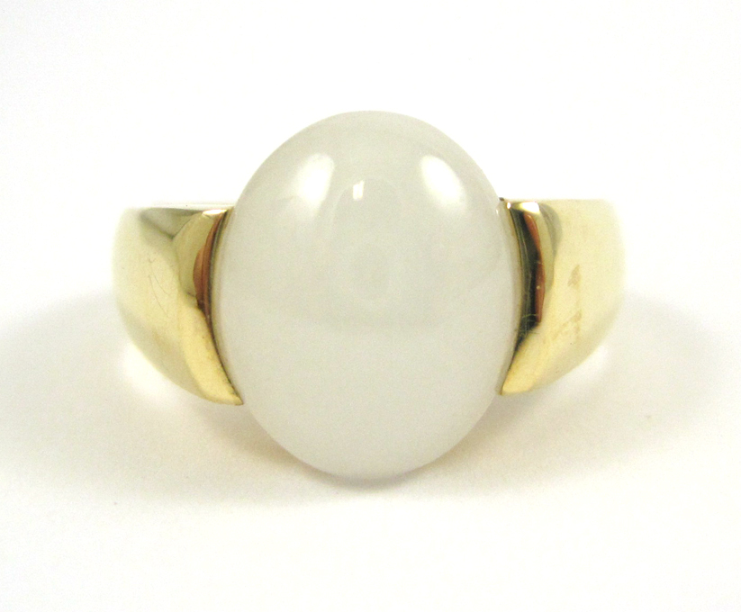 Appraisal: WHITE JADEITE JADE AND FOURTEEN KARAT GOLD RING with Mason