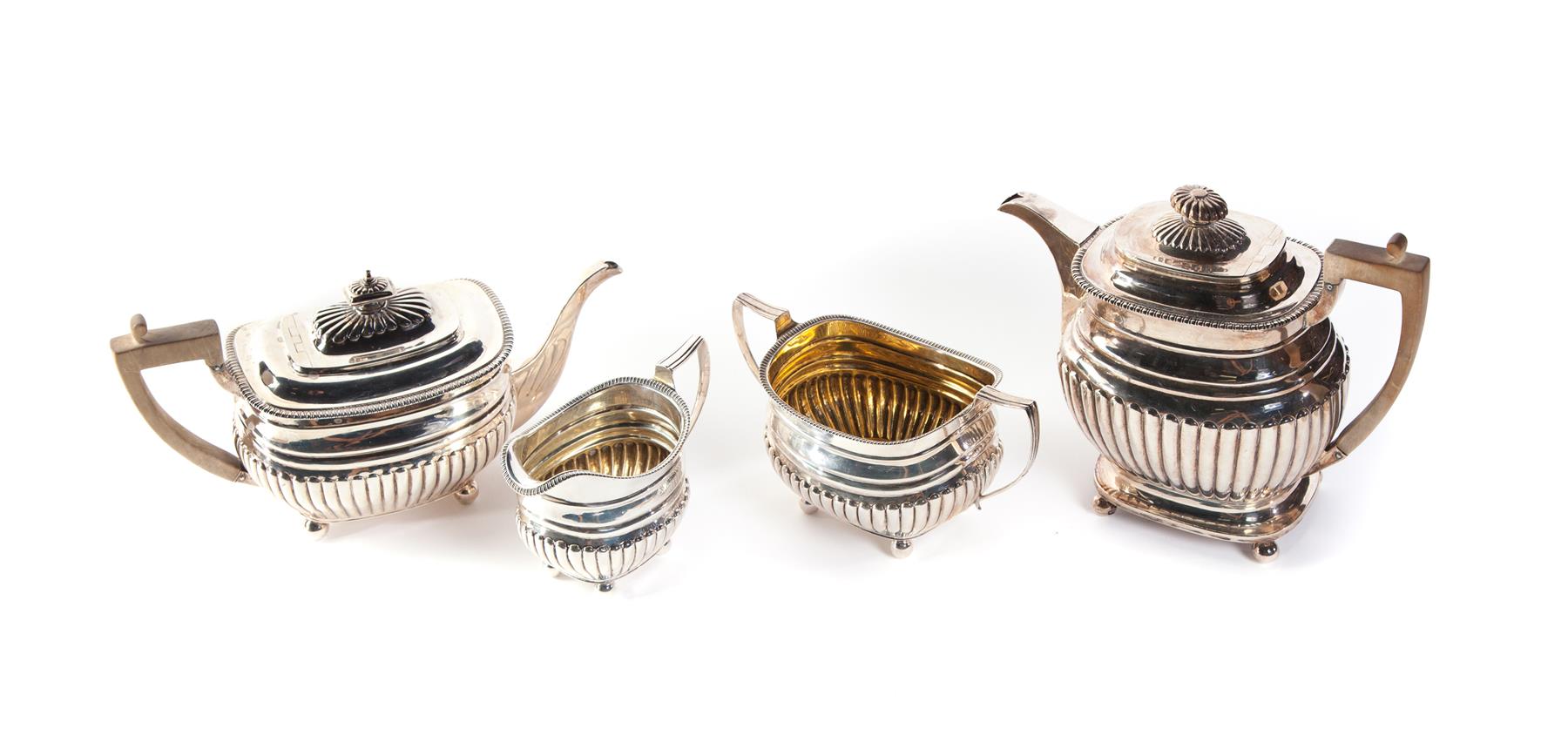 Appraisal: FOUR ENGLISH SILVER TEA SERVICE PIECES London hallmarks Similar designs