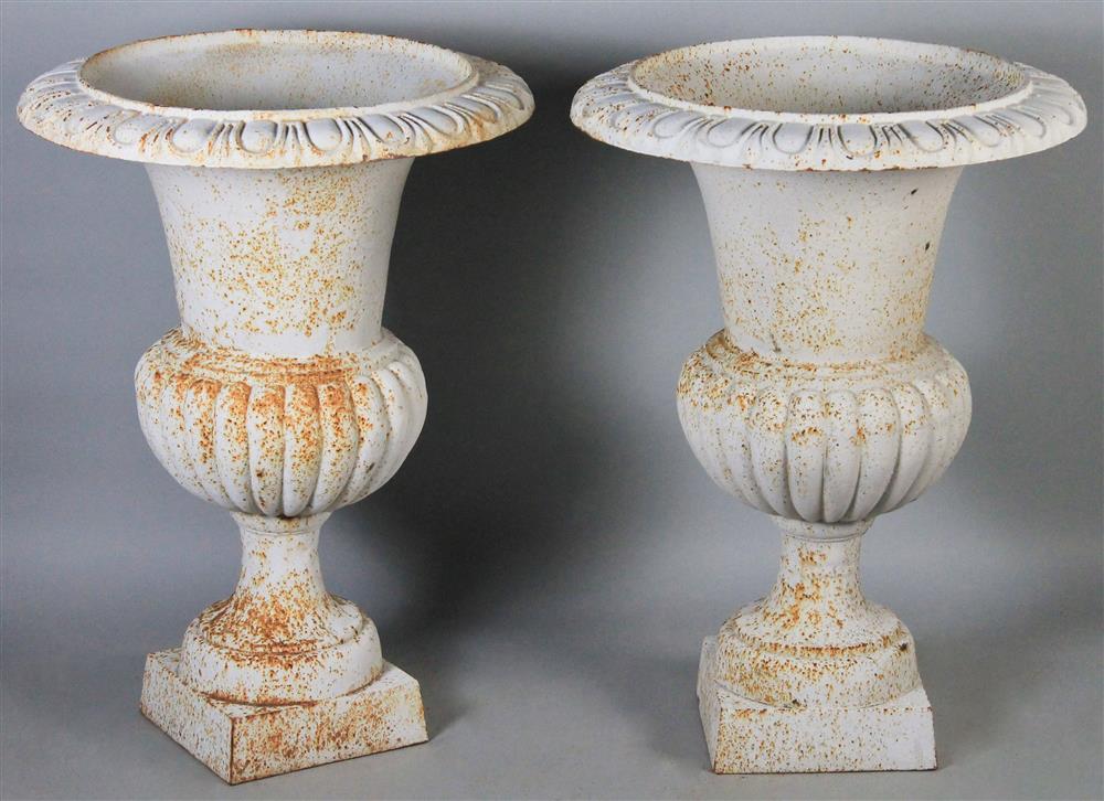 Appraisal: PAIR OF WHITE PAINTED CAST IRON GARDEN PLANTERS pair of