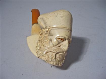 Appraisal: A Meerschaum Pipe Styled as a bearded man wearing a