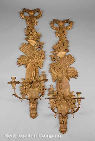 Appraisal: A Pair of Louis XVI-Style Carved Giltwood Two-Light Sconces in