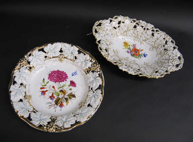 Appraisal: TWO GERMAN PORCELAIN SERVING BOWLS having colorful floral bouquet center