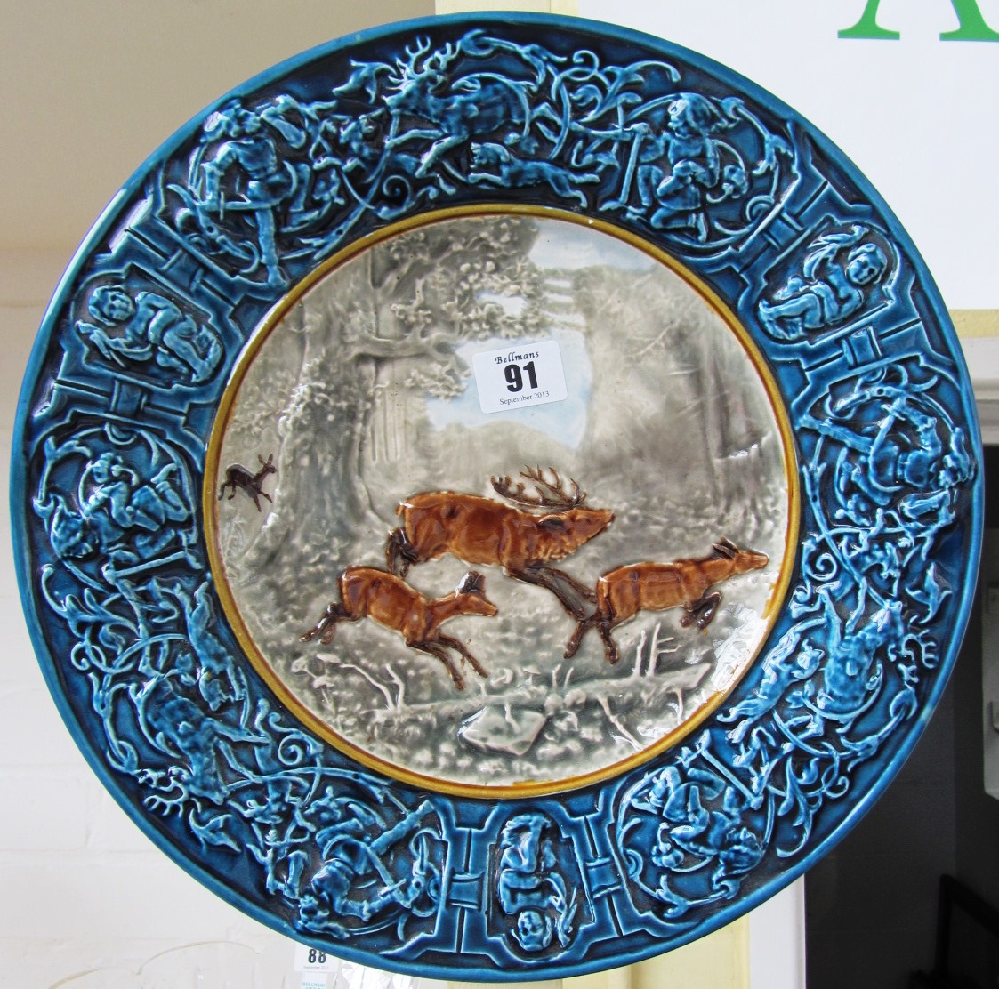 Appraisal: A Czechoslovakian relief moulded charger th century detailed with stag