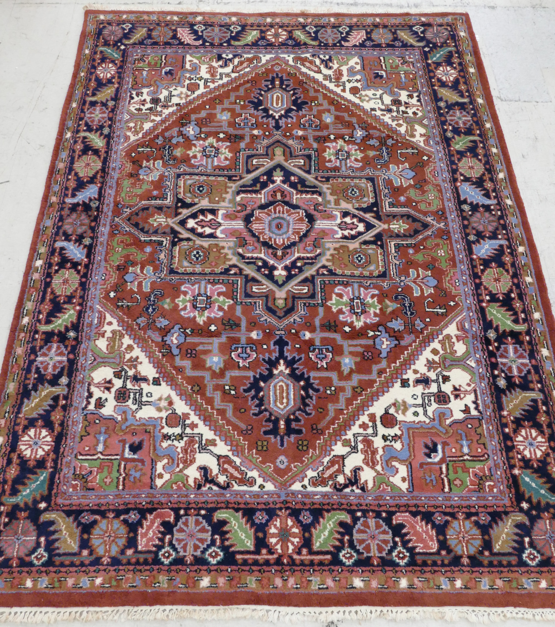 Appraisal: Persian Heriz Oriental Rug 'x ' '' Geometric medallion motif