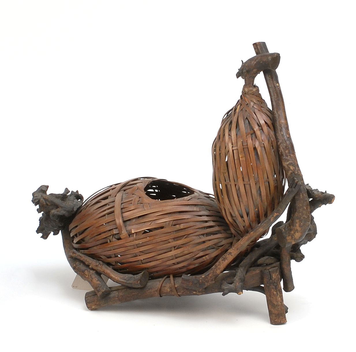 Appraisal: SPLINT BAMBOO IKEBANA BASKET Circa In double gourd form with