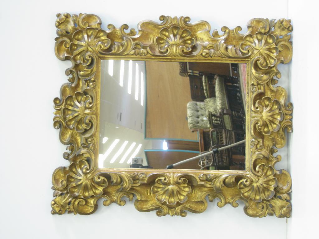 Appraisal: An Italianate gilt framed rectangular Wall Mirror with scallop and