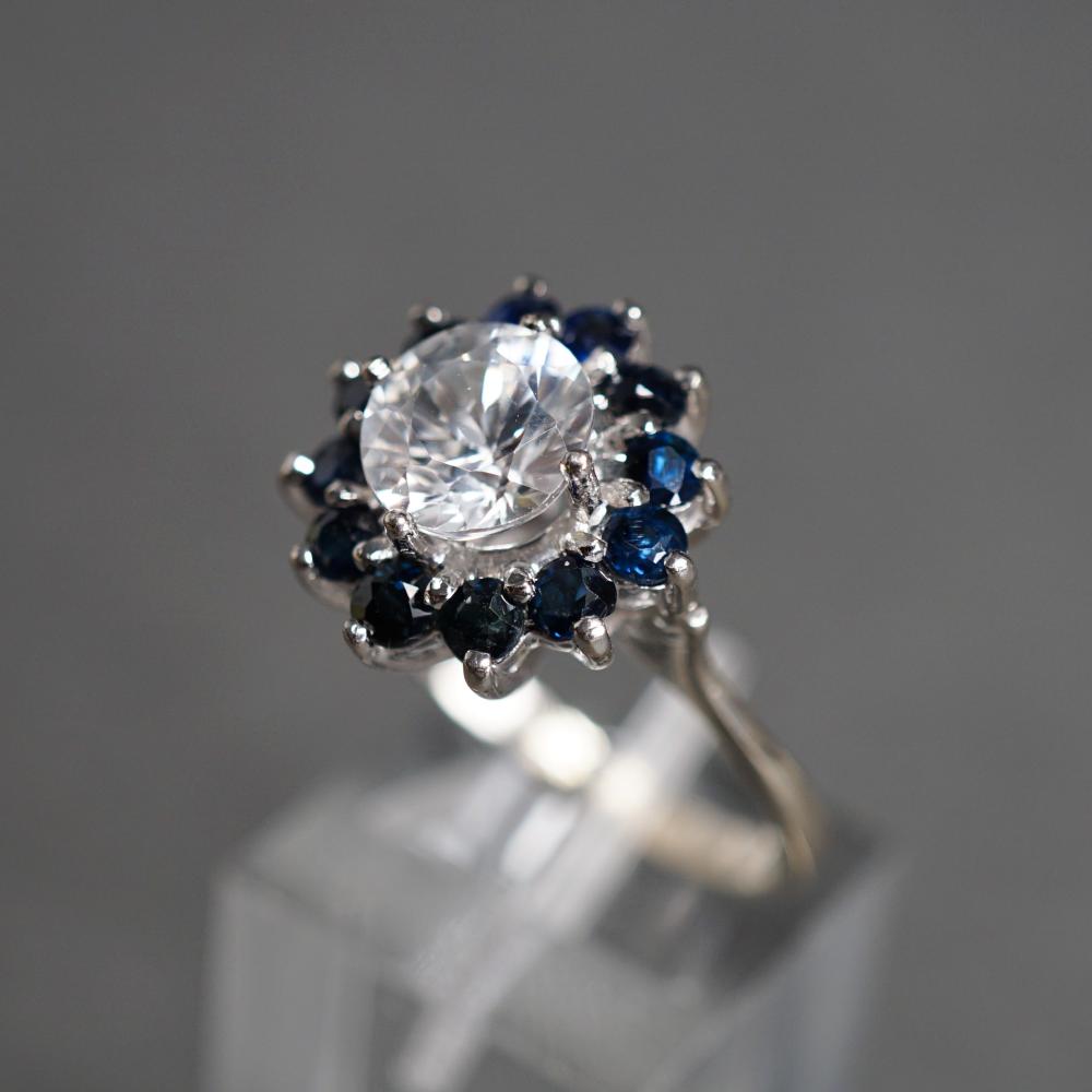 Appraisal: -KARAT WHITE-GOLD WHITE ZIRCON AND BLUE SAPPHIRE RING GROSS DWT