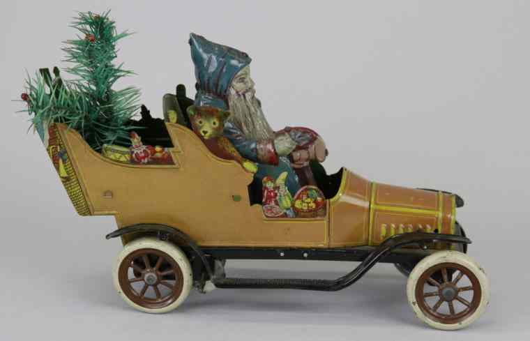 Appraisal: FISCHER FATHER CHRISTMAS CAR c extremely rare example featuring tin