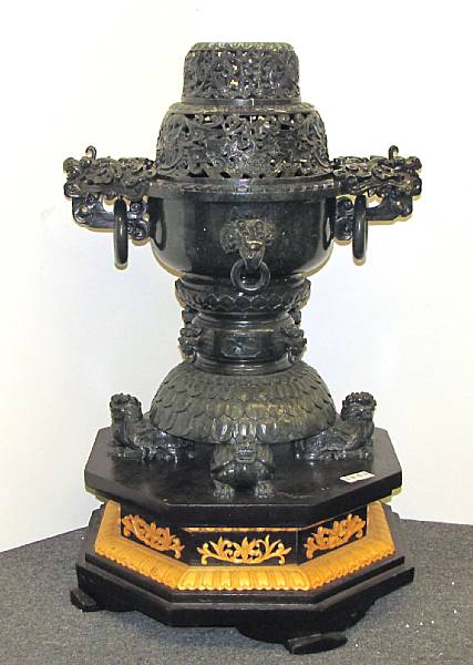 Appraisal: A large Chinese carved deep green hardstone censer on wooden