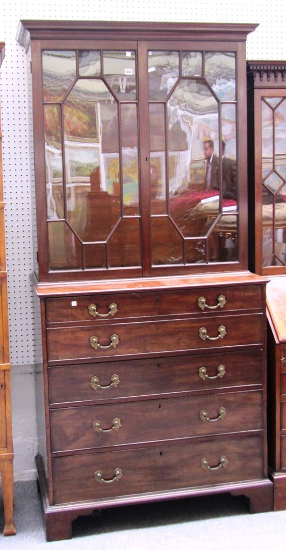 Appraisal: A George III mahogany secretaire bookcase the pair astragal doors