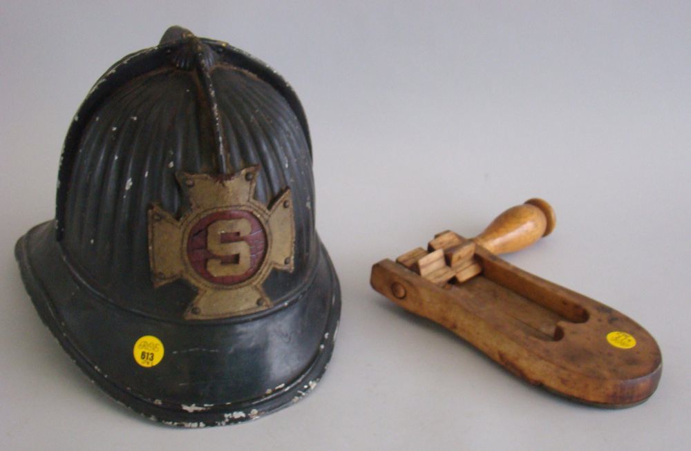 Appraisal: TWO PIECES OF FIREFIGHTER MEMORABILIA th century tin fire helmet