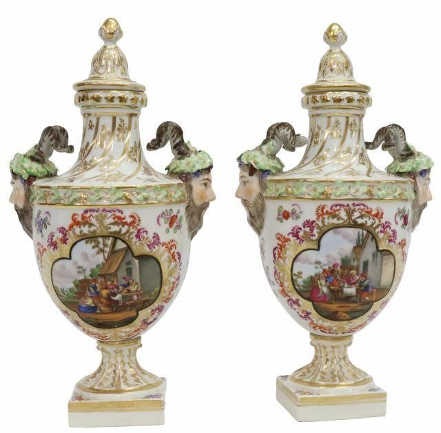 Appraisal: pair Dresden parcel gilt porcelain bolted urns attributed to Helena