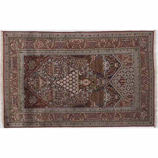 Appraisal: Persian Silk Rug Iranian A silk rug with stepped border