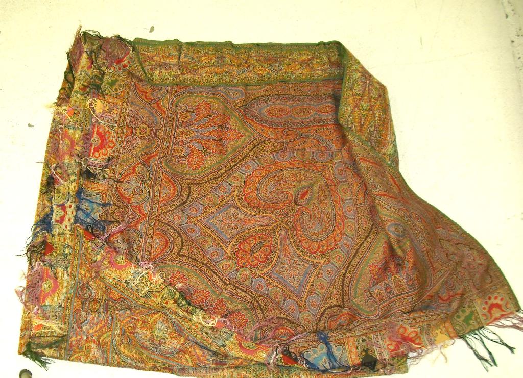 Appraisal: Large woven paisley shawl worked in typical patterns and colours