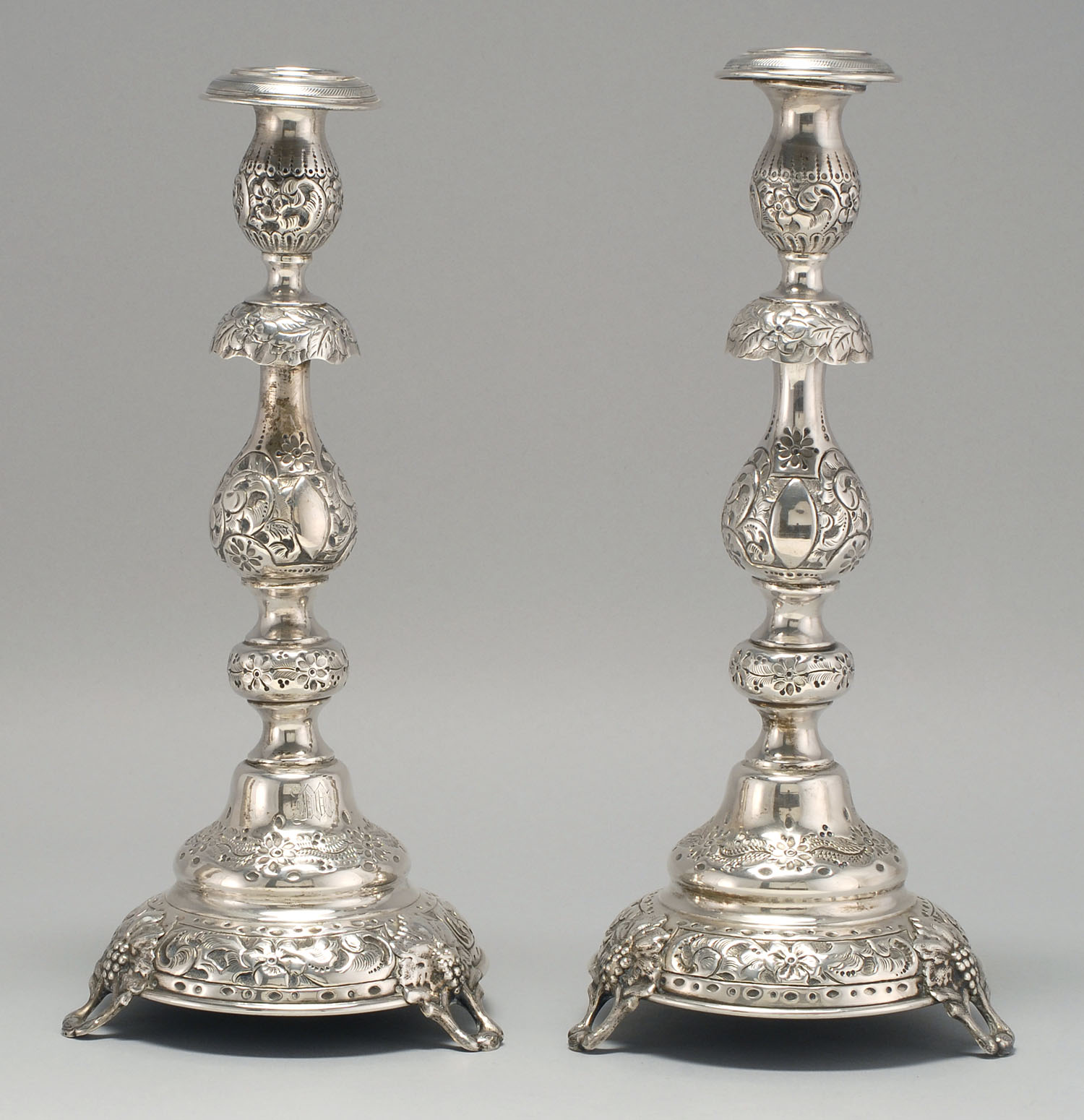 Appraisal: PAIR OF RUSSIAN FINE SILVER CANDLESTICKS St Petersburg With repouss