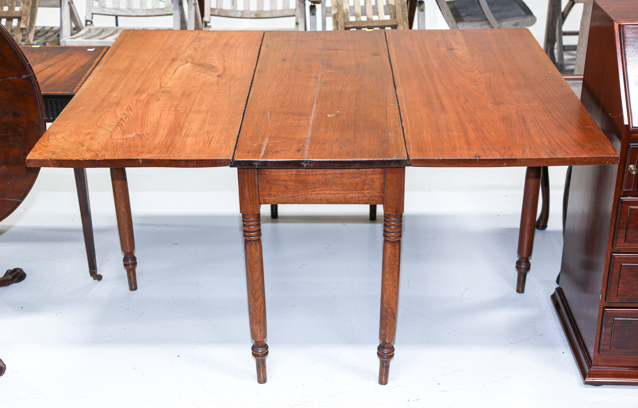 Appraisal: AMERICAN VERNACULAR DROP LEAF TABLE Southern Mid th century butternut