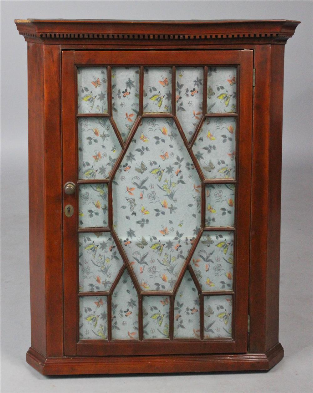 Appraisal: AMERICAN CHIPPENDALE CHERRYWOOD HANGING CORNER CUPBOARD the outset molded cornice