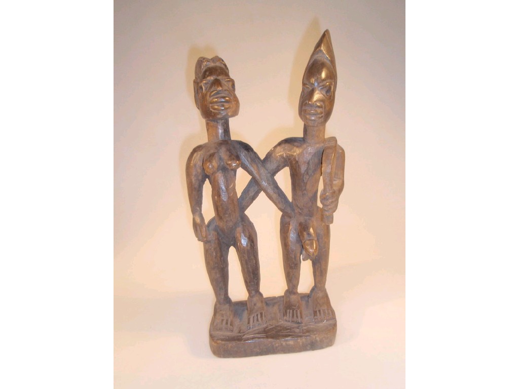 Appraisal: A Yoruba figure group of a male and female on