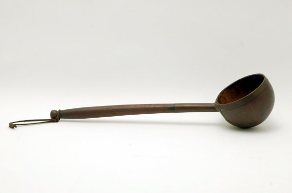 Appraisal: DESCRPTION Handmade ladle of copper and wood turned wood handle