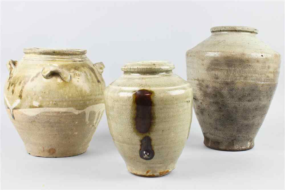 Appraisal: THREE CHINESE STORAGE VESSELS TANG SONG DYNASTY all of tall