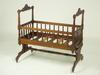 Appraisal: VICTORIAN CRADLE - Mahogany Victorian child's cradle ca Shaped spindles