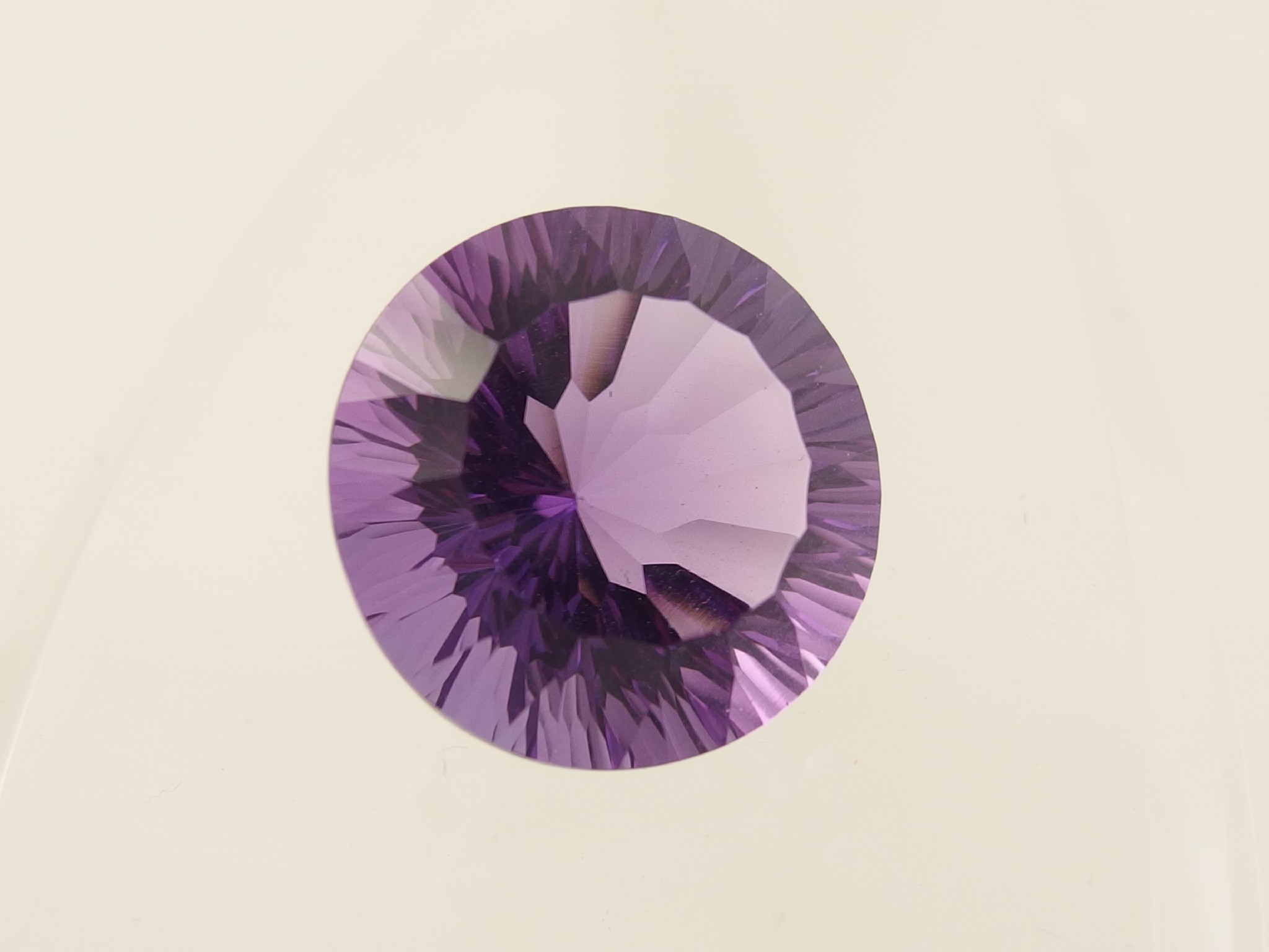 Appraisal: A fancy cut round amethyst of approx cts