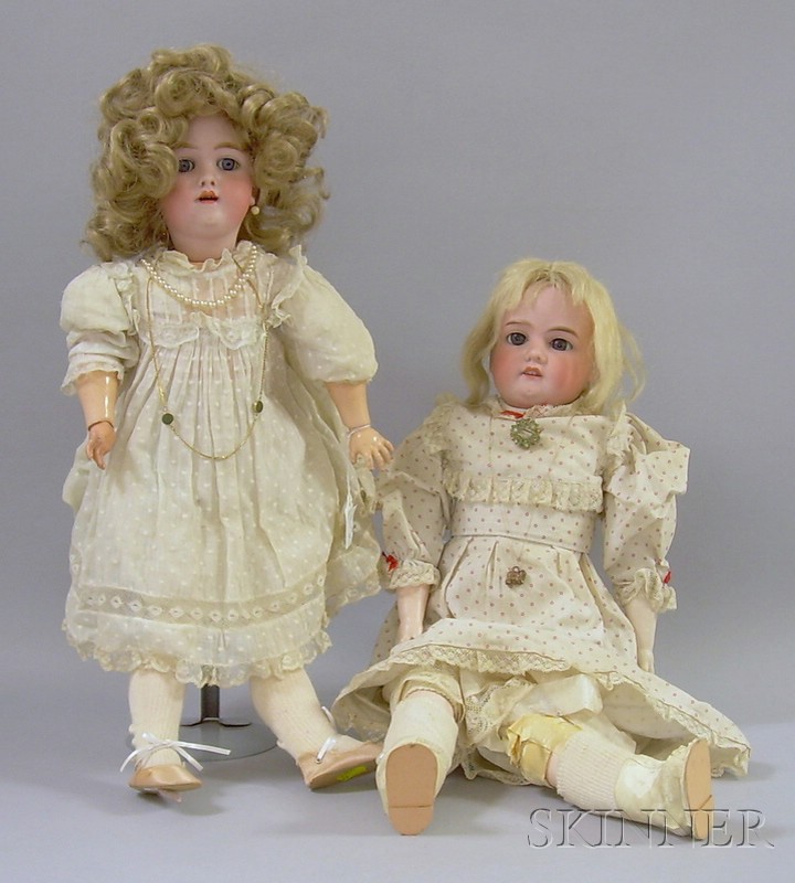 Appraisal: Two Blonde Bisque Head Dolls in White Dresses Armand Marseille