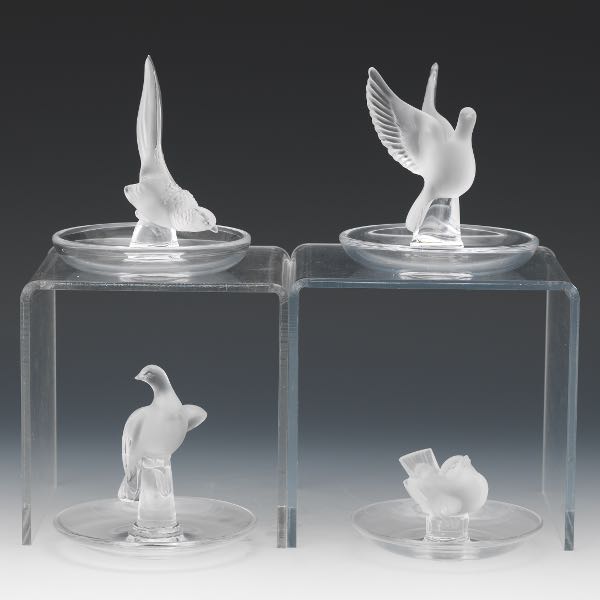 Appraisal: FOUR LALIQUE BIRD RING HOLDERS Four Lalique ring holders with