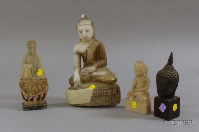 Appraisal: Three Asian Carved Stone Buddhas and a Bronze Bust of