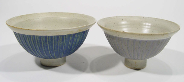 Appraisal: Two stoneware Studio pottery pedestal bowls with purple and blue