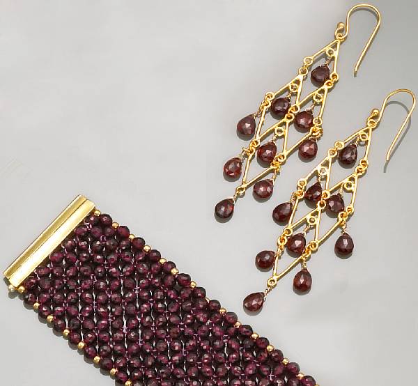 Appraisal: Garnet Bracelet and Earrings Consisting of a mesh of faceted