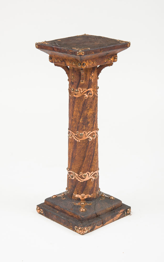 Appraisal: UNUSUAL LEATHER-COVERED AND COPPER-DECORATED PEDESTAL Circa x x in Estimate