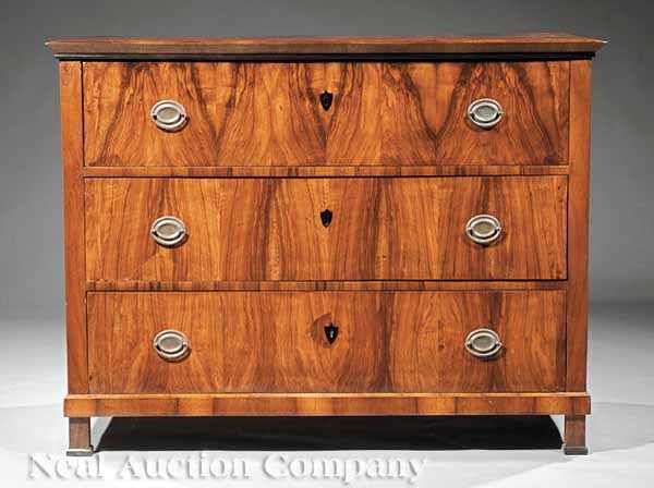 Appraisal: An Italian Neoclassical Figured Walnut Commode th c molded top