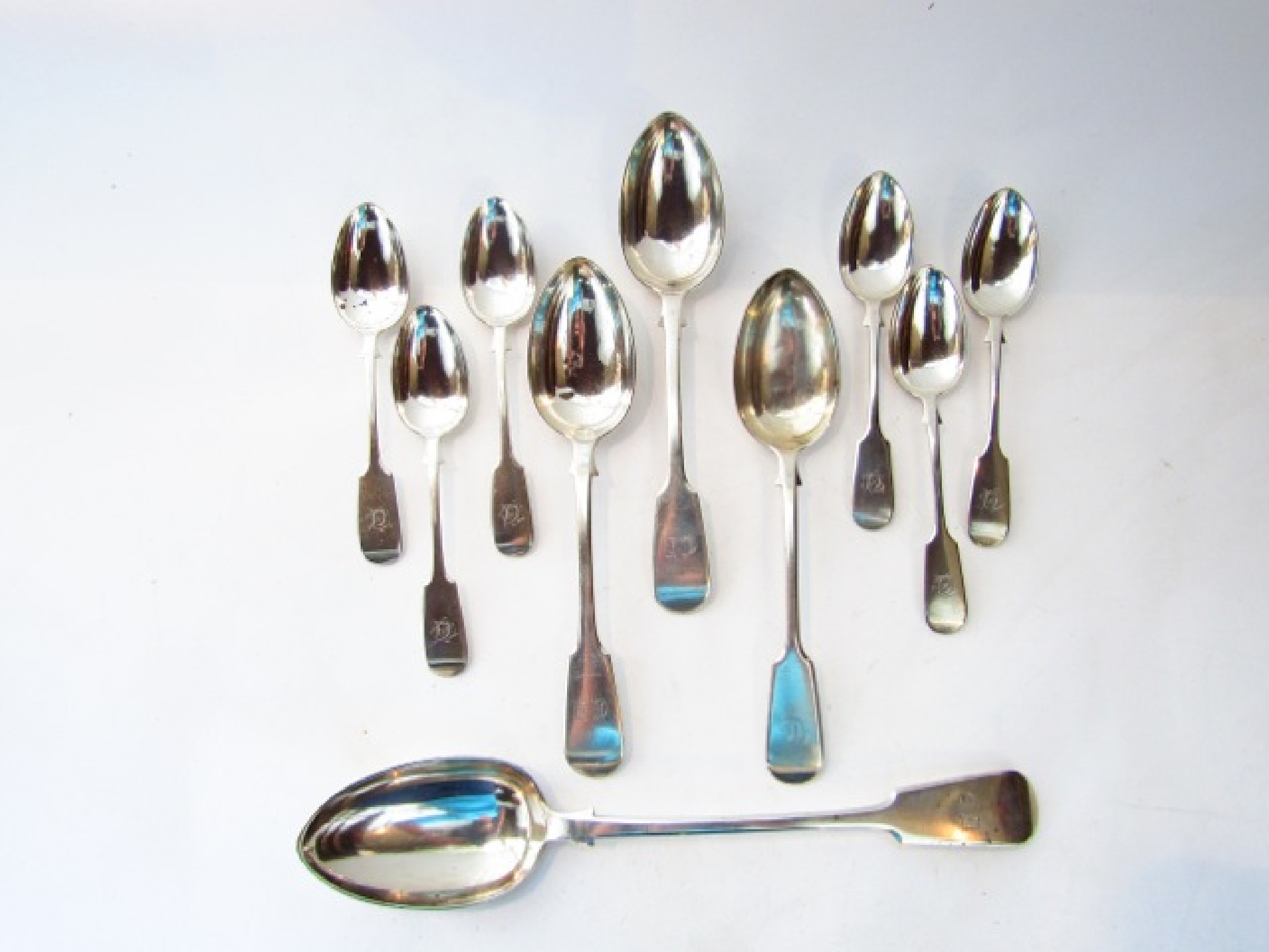 Appraisal: A set of six Victorian silver Fiddle pattern dessert spoons