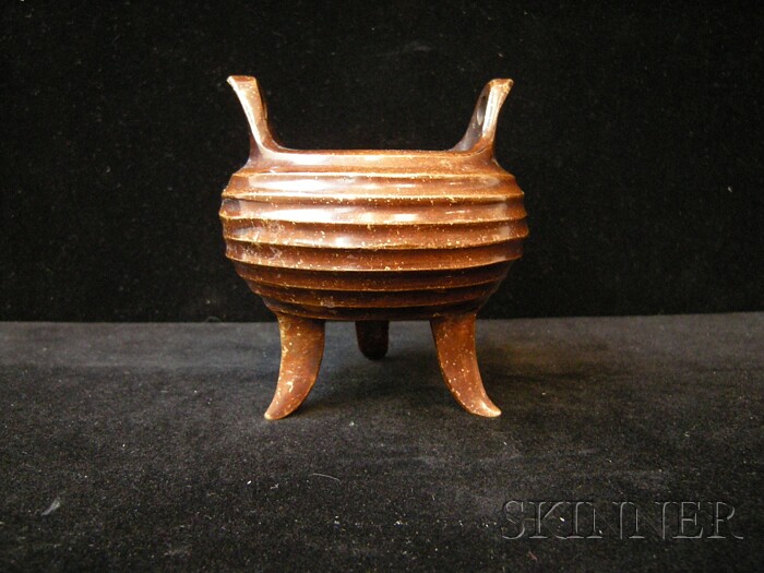 Appraisal: Bronze Censer China the compressed globular body cast with grooves