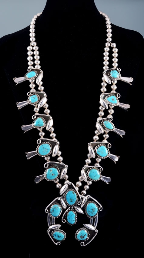 Appraisal: NATIVE AMERICAN SQUASH BLOSSOM NECKLACE Silver and turquoise unsigned ''