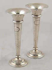 Appraisal: A pair of silver trumpet vases with hammered finish Walker