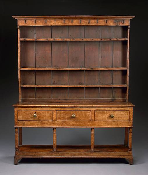 Appraisal: A George III Provincial oak high dresser late th early