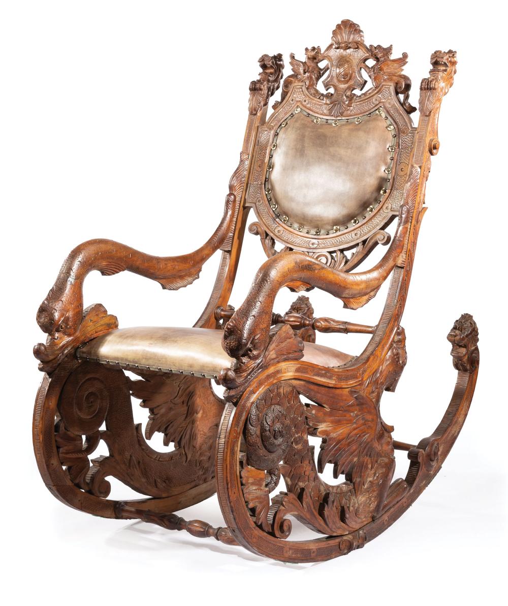 Appraisal: Italian Carved Walnut Fantasy Rocking Chair mid- th c crest