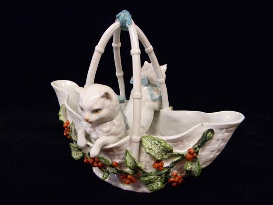 Appraisal: Porcelain double cat basket two full figure kittens standing inside