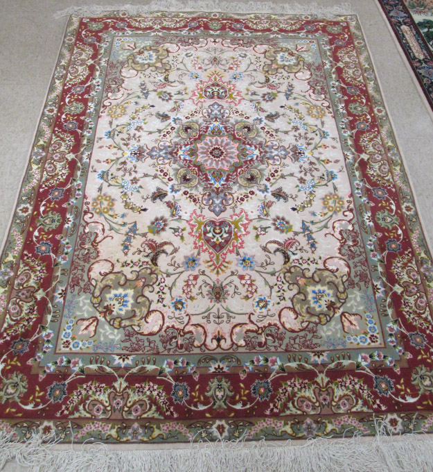 Appraisal: FINE PERSIAN SILK AND WOOL AREA RUG hand knotted in