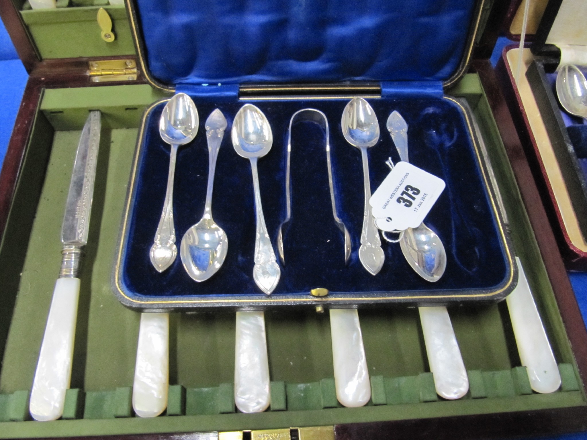 Appraisal: A lot comprising a part silver spoon and tong set