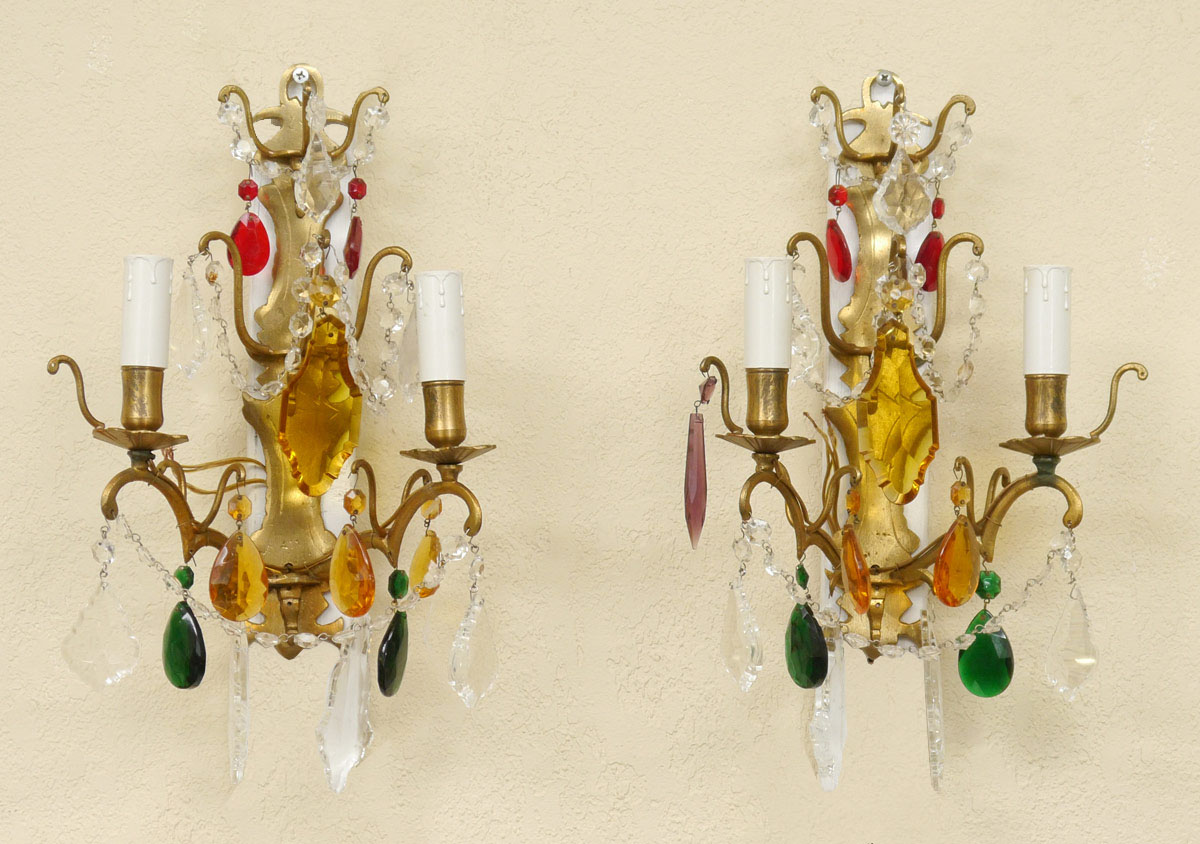 Appraisal: PAIR MULTICOLORED WALL SCONCES Double light brass frame Clear amber